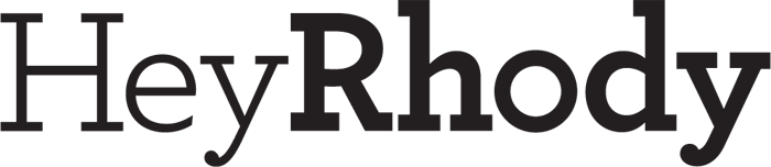 Logo for HeyRhody, featuring stylized text in a modern design.